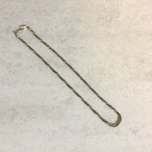 Triple strand twisted gold and silver necklace